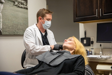 Dr Foust preparing for implant surgery.