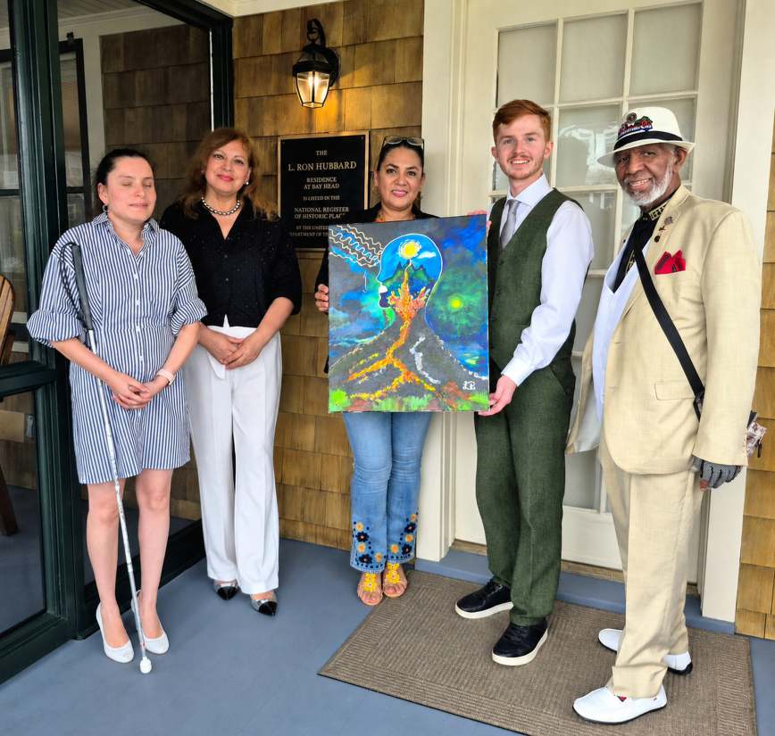 Lorena Ramos presenting her original artwork.